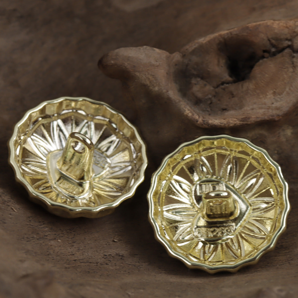 Round gold metal shank buttons, engraved fan pattern and loop shanks