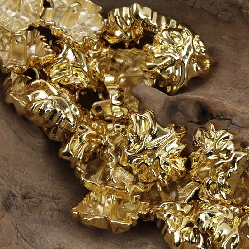 3D leaf-shaped metal buttons with shank, gold finish, hole and shank details