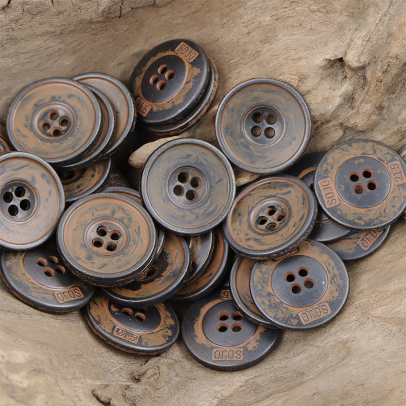 Vintage 4-hole metal buttons, rusty and blue-gray patina, worn outer rim