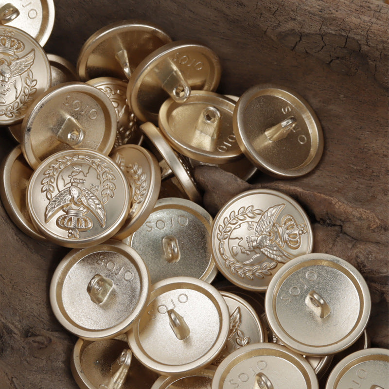 Gold-tone metal buttons with crown-and-eagle crest; round faces and shank backs
