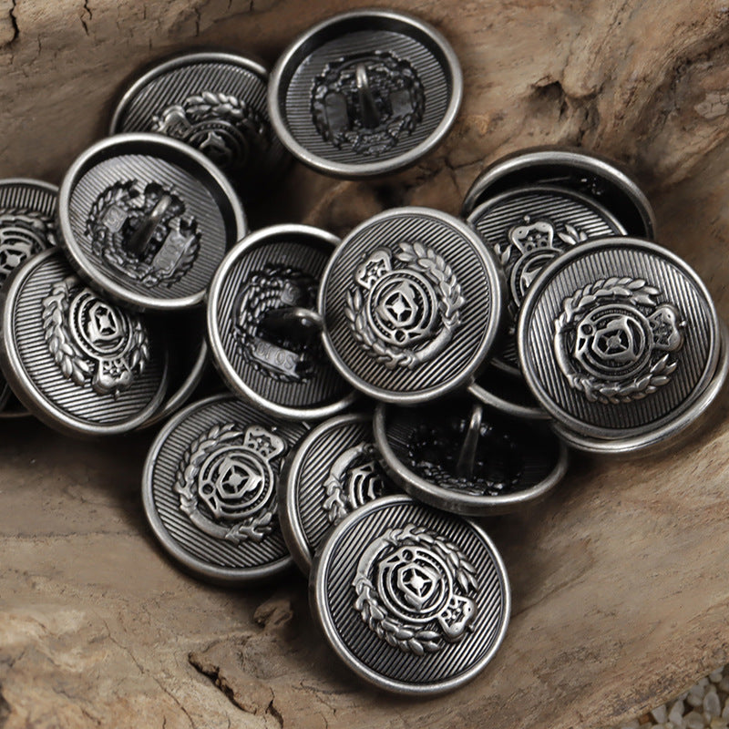 Black-silver wheat shield crest buttons, round metal fronts with central wreath emblem