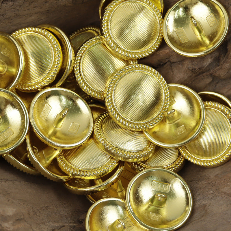 Gold-toned vintage striped metal buttons with shank, ridged border, multiple pieces