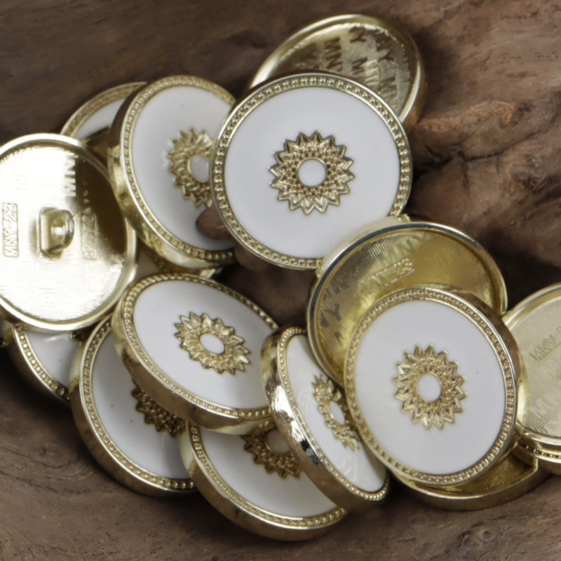 Gold tone floral snap buttons, white centers with ornate star-flower cutout, multiple