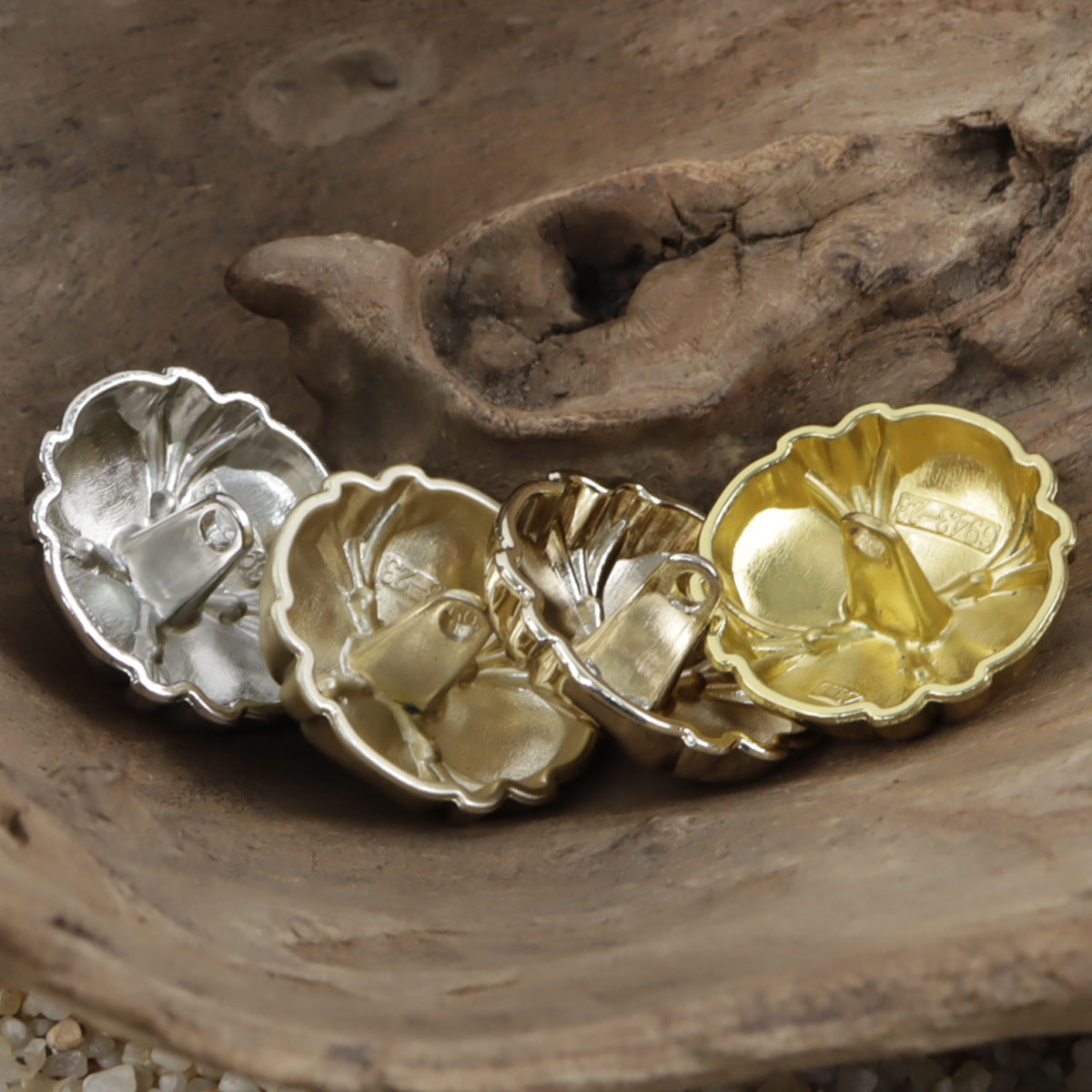 Four-leaf clover metal shank buttons in silver, light gold, and misty gold tones