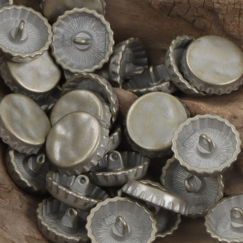 Silver-toned bottle cap metal buttons with loop backs, round faces and textured center