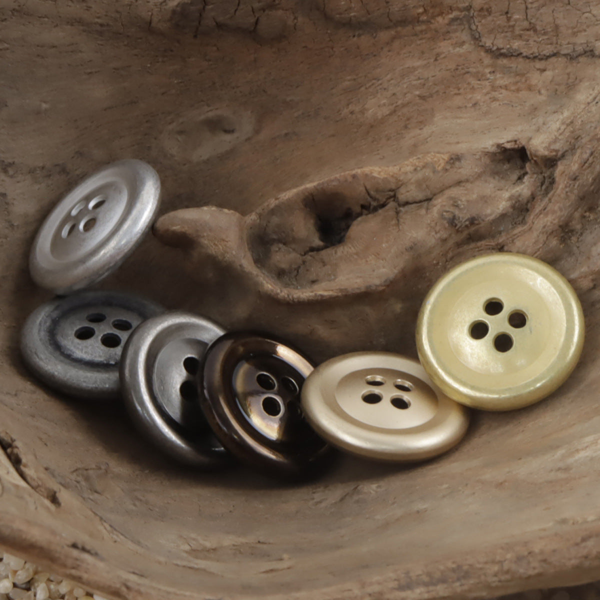 Vintage 4-hole double-sided metal buttons, mixed metallic colors (close-up)