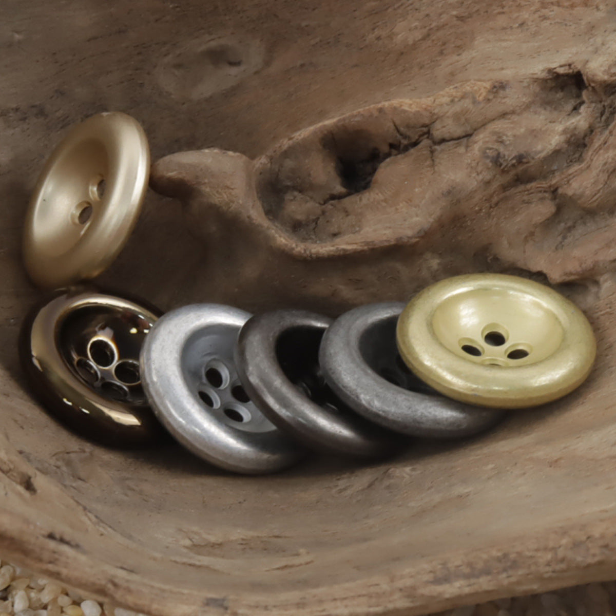 Vintage 4-hole double-sided metal buttons, gold and silver tones (close-up)
