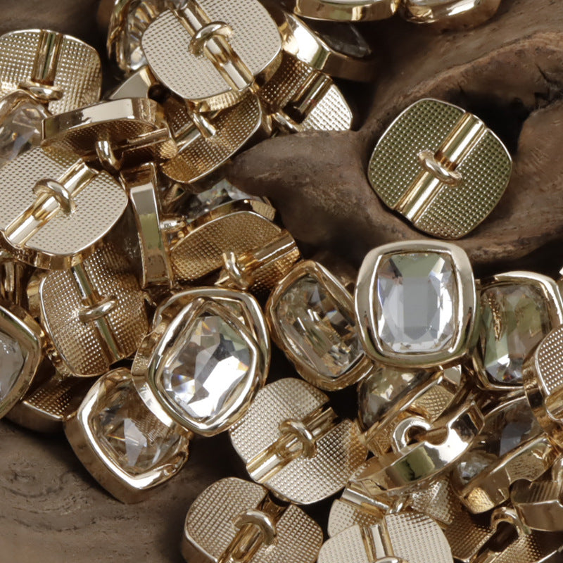Bulk mix of rhinestone metal shank buttons with clear stones and gold-tone shanks