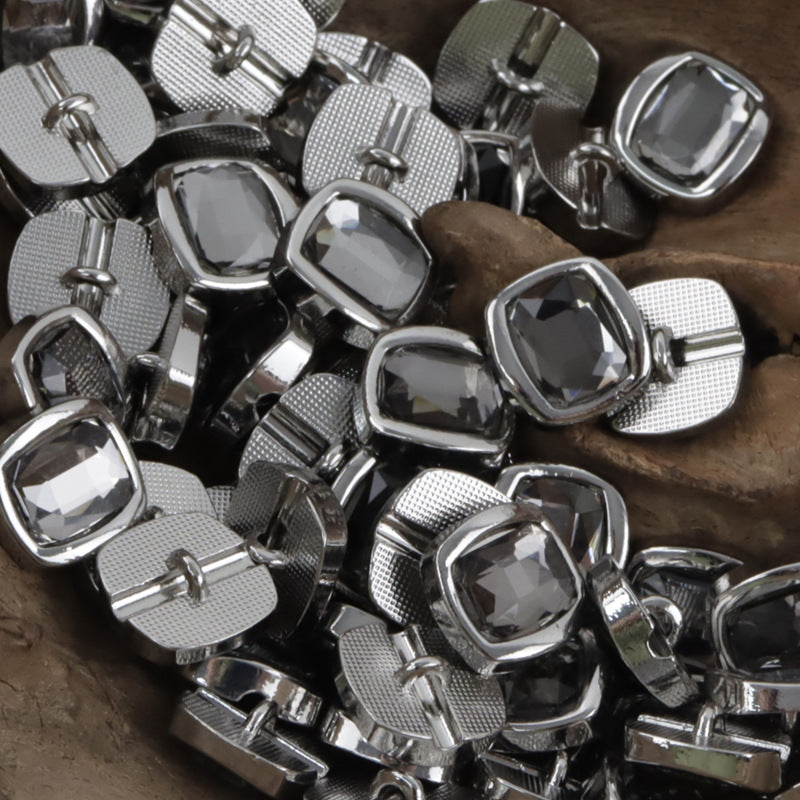 Rhinestone metal shank buttons with smoky gray faceted stones and silver frames