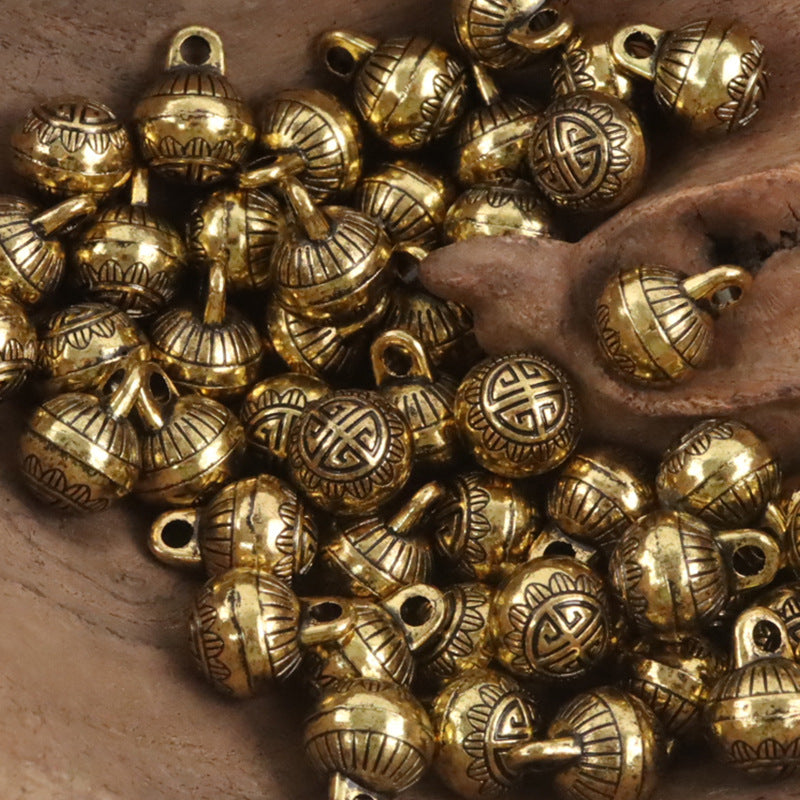 Gold metal shank buttons assortment, round floral and knot motifs with loop shanks