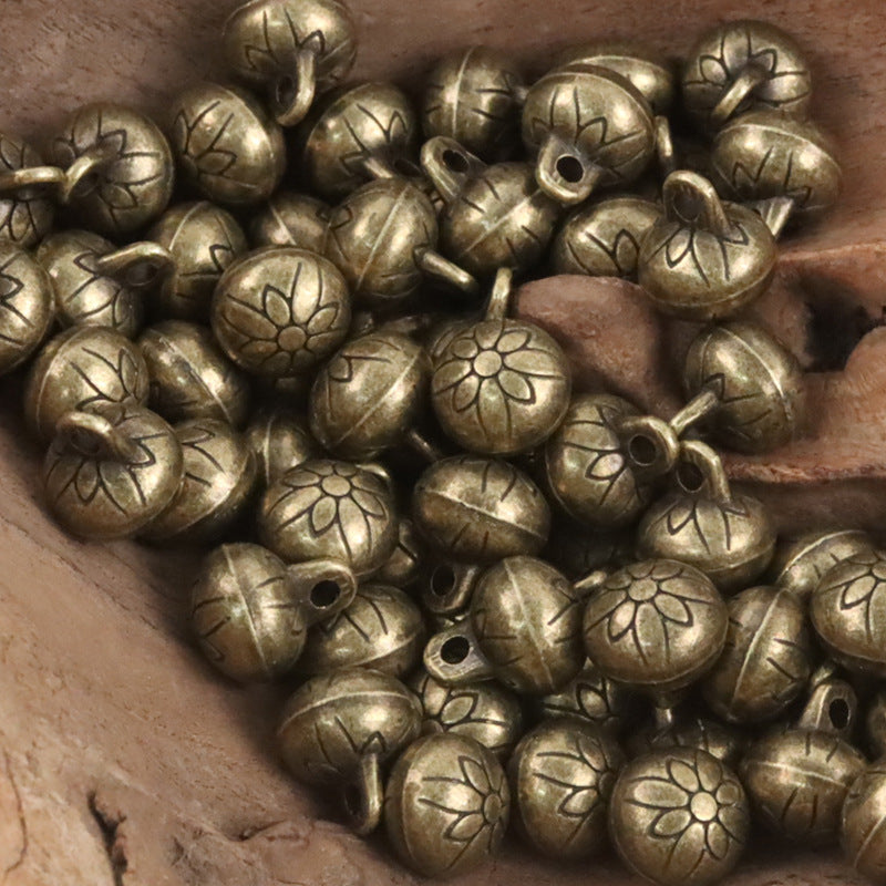 Antique bronze high-foot shank buttons with floral pattern, 2-hole design
