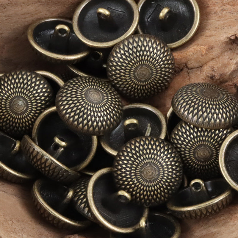 Black round shank metal buttons with geometric pattern, mixed with antique gold buttons