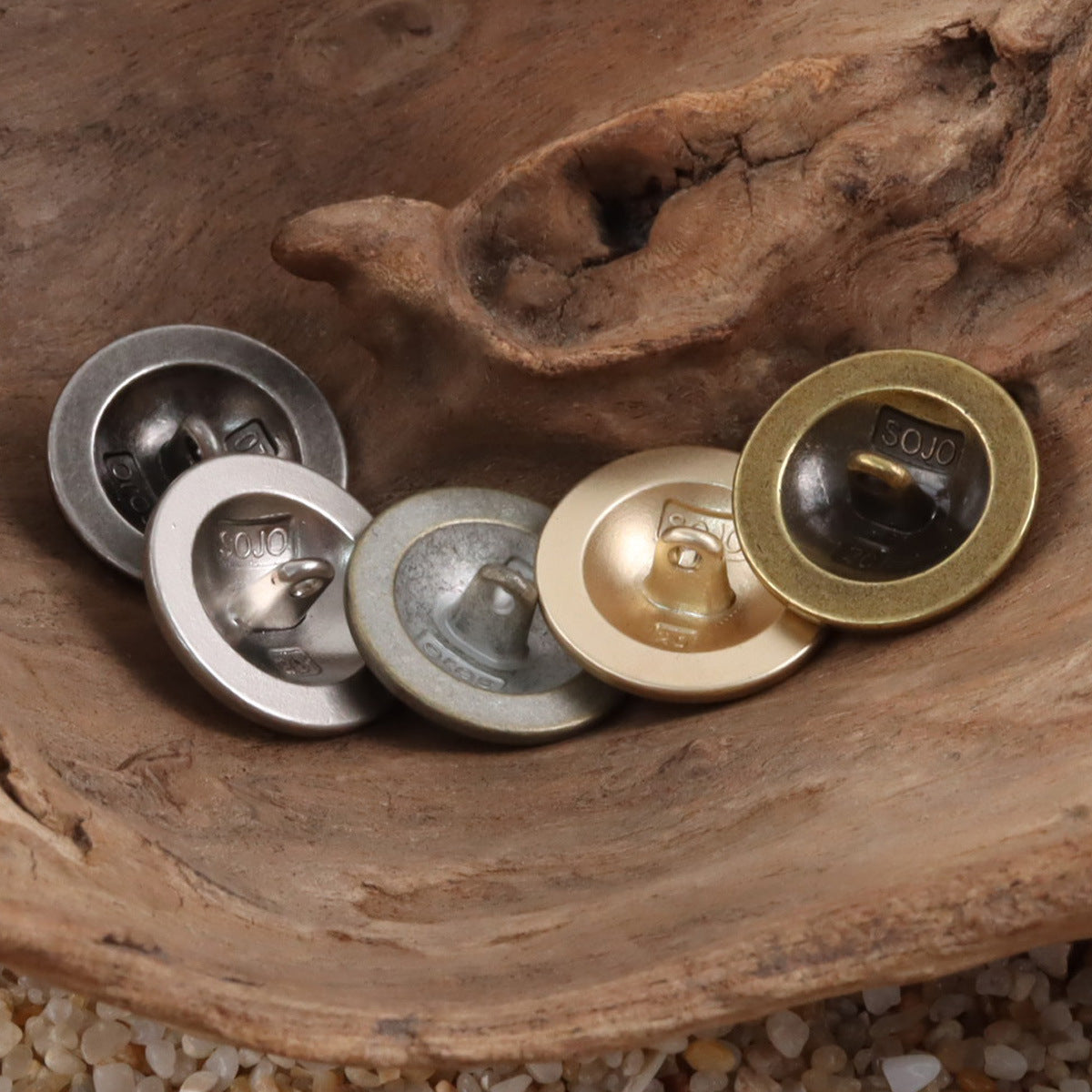 Metal shank buttons with Double Lion Crown crest on round faces, gold and silver tones