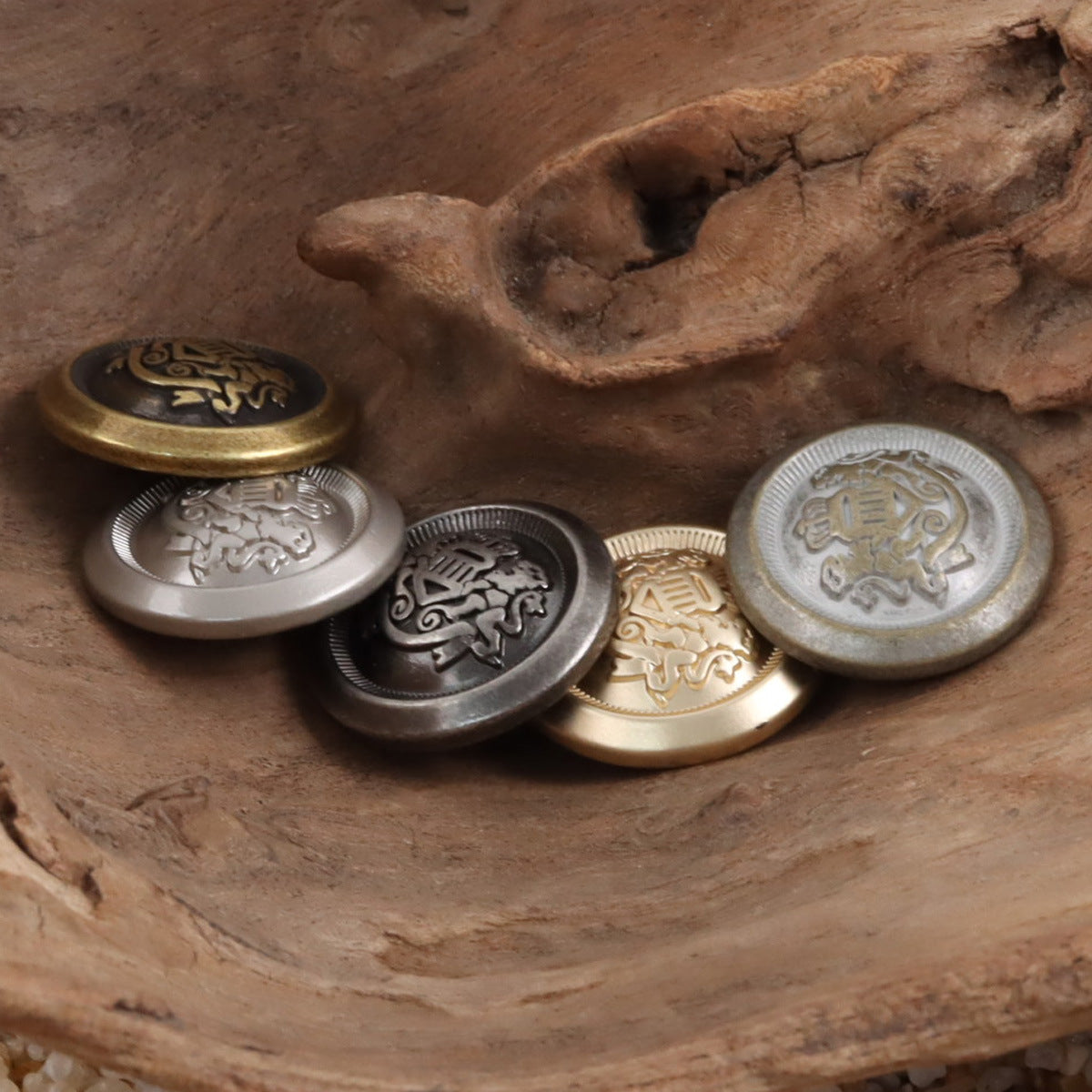 Round metal shank buttons with Double Lion Crown emblem, gold and silver finishes