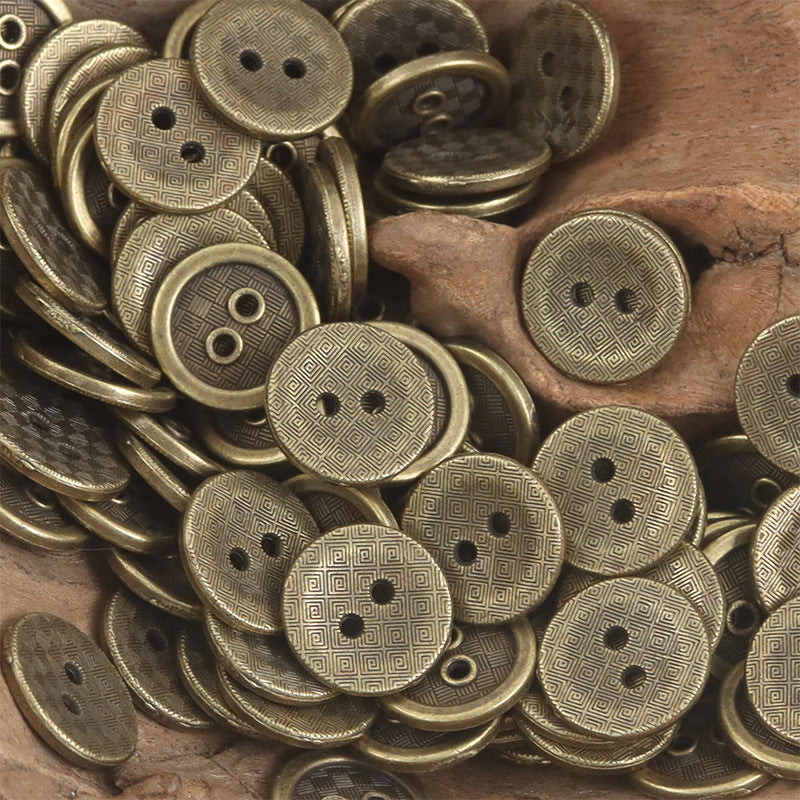 Bronze metal flat buttons assortment with geometric and textured patterns