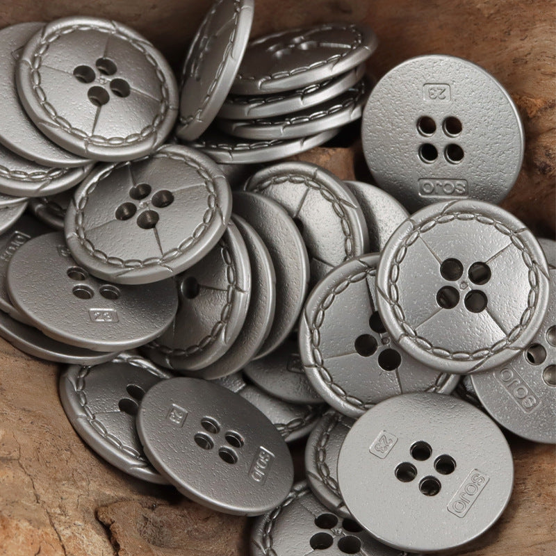Vintage distressed metal buttons in silver tone; 4-hole face with stitched rim (10pcs)