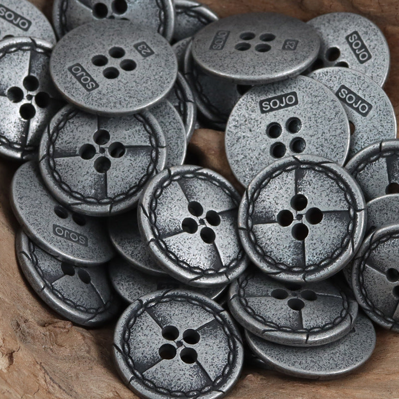 Vintage distressed metal buttons in dark silver/gray; 4-hole face with stitched border