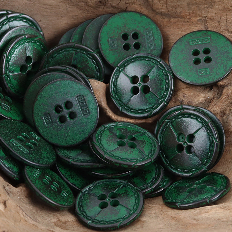 Vintage distressed metal buttons in green tone; 4-hole face with stitched rim (10pcs)