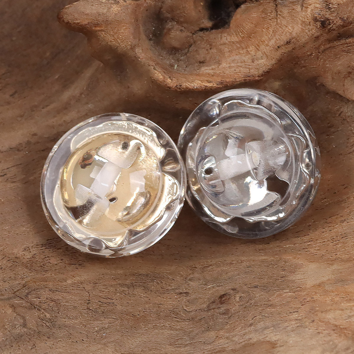 Crystal flower resin shank buttons, one gold and one silver back with metal posts