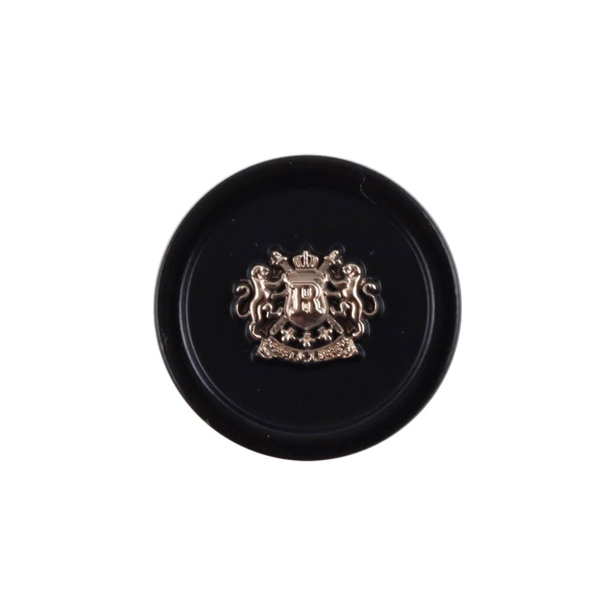 Black shank button with gold crest emblem, round metal-look center