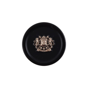 Black shank button with gold crest emblem, round metal-look center