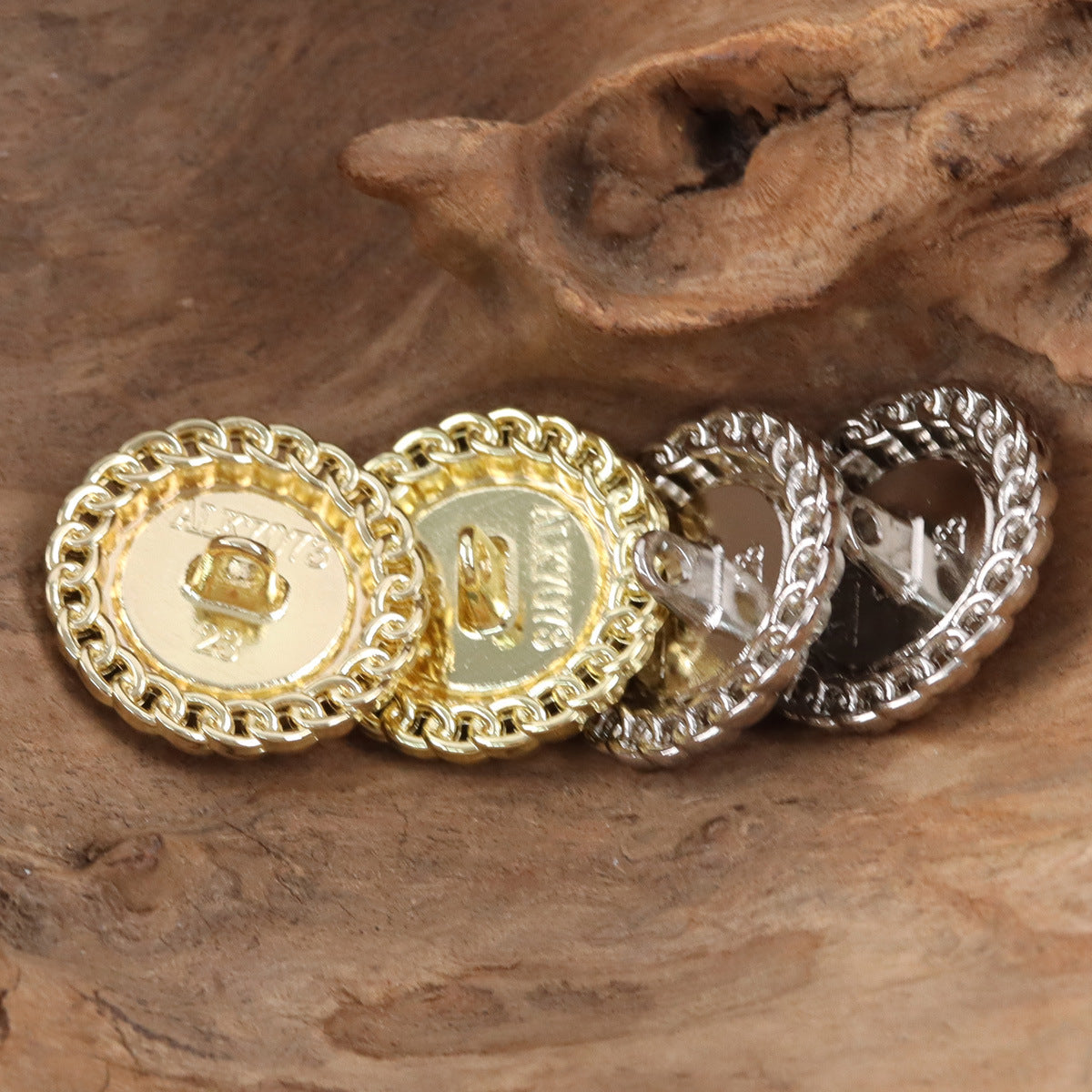 Set of buttons backs: gold and silver metal loops with central shank posts