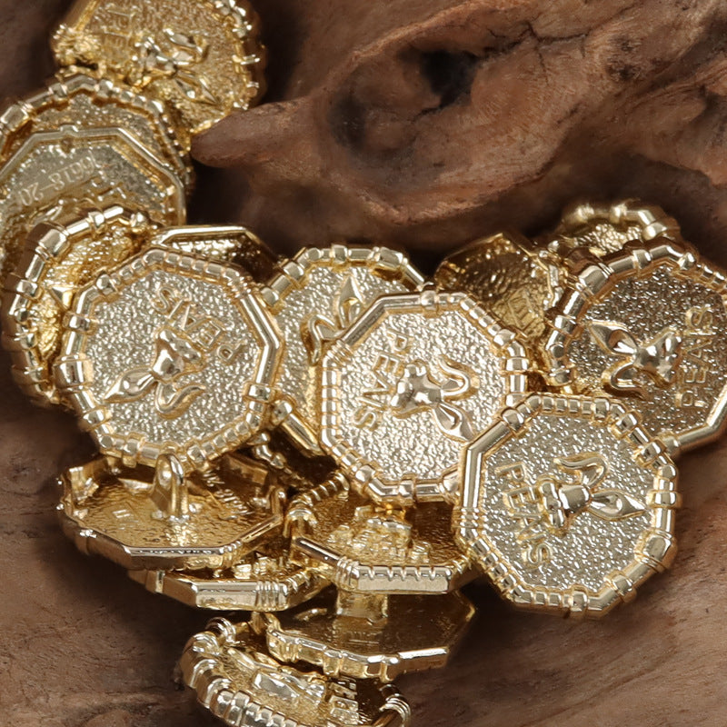 Metal buttons with rabbit crest and “PEAS”, mostly gold tone