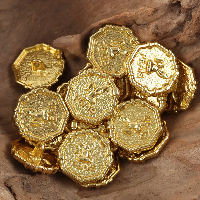 Gold metal buttons with rabbit sheriff design and “PEAS” lettering