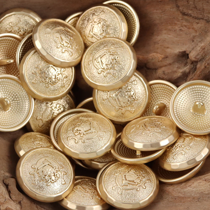 Metal shank buttons, mostly gold with a few silver fronts, round crest medallion design