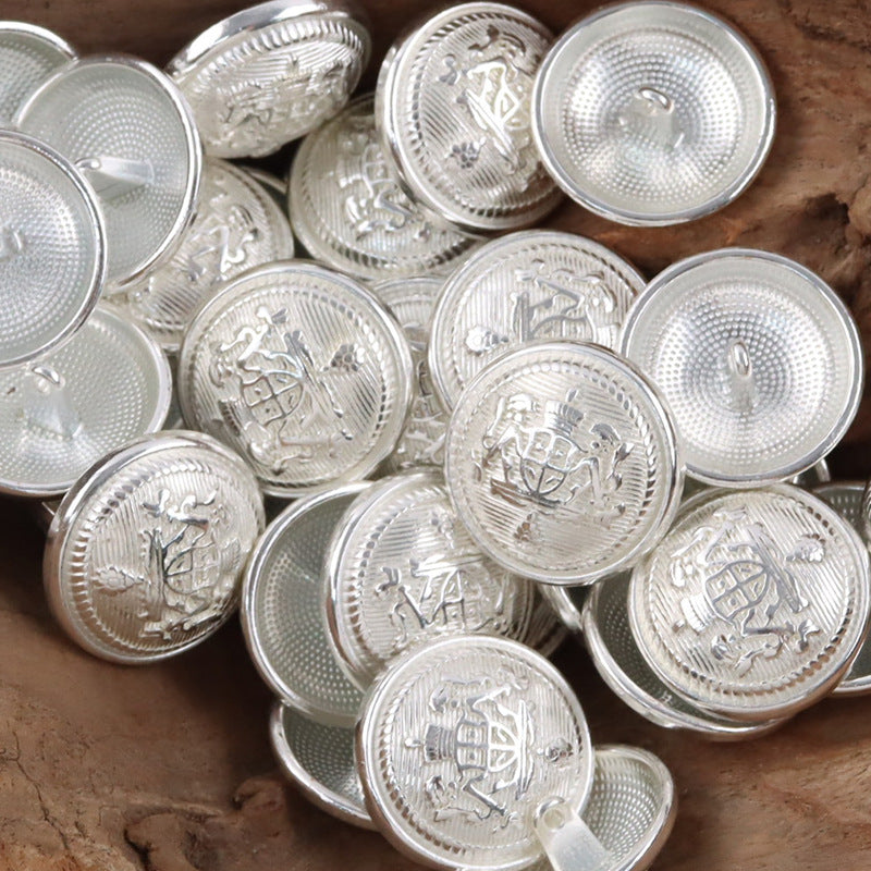 White-silver metal buttons, round crown-shield emblem with ridged edge and loops