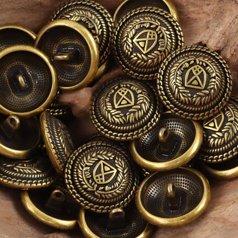 Bronze metal shank buttons, crest medallion design on front and shanks
