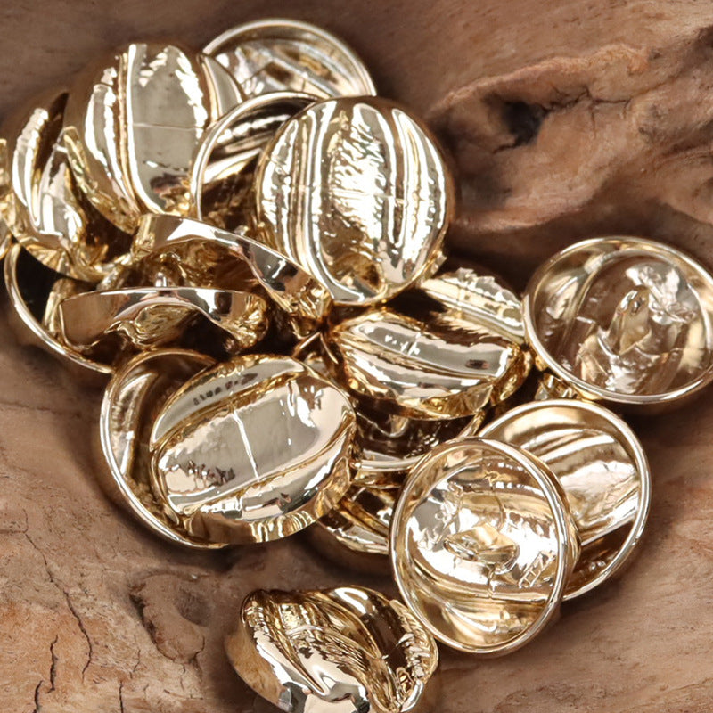 Mixed set of irregular oval metal shank buttons, gold and silver fronts
