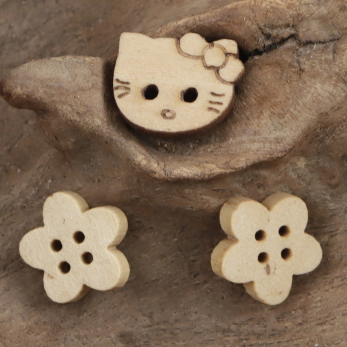 Wood buttons: Kitty (13mm) face with bow plus 2 Flower (11.5mm), with holes