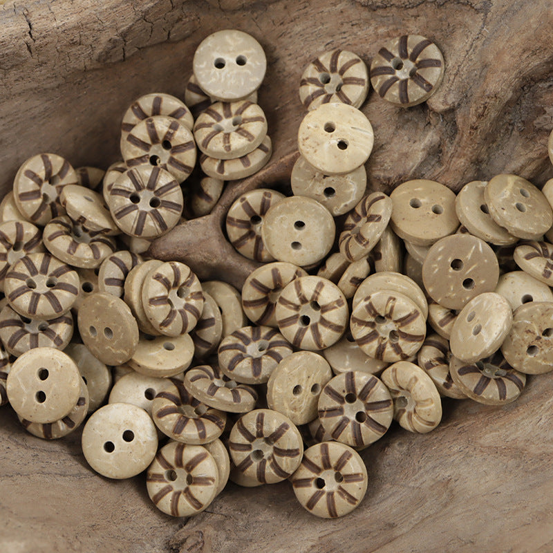 Bread-shaped coconut shell buttons, two holes, beige with dark striped segments