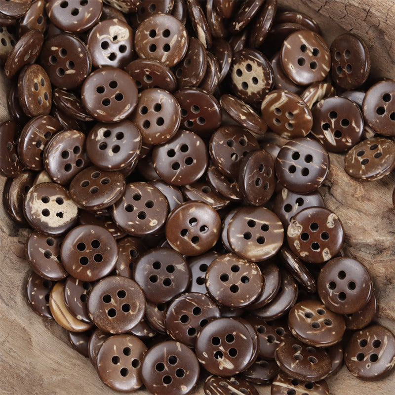 Mixed brown round coconut shell buttons with 4-hole fronts, assorted tones shown (pile).