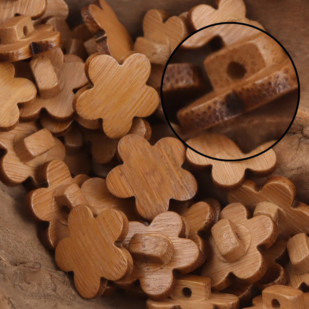 Light bamboo plum blossom button detail with visible two-hole attachment