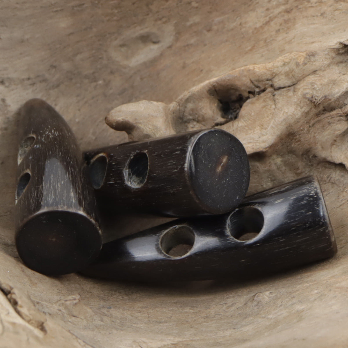 Horn-style toggle buttons, dark brown, large rounded end with two small holes