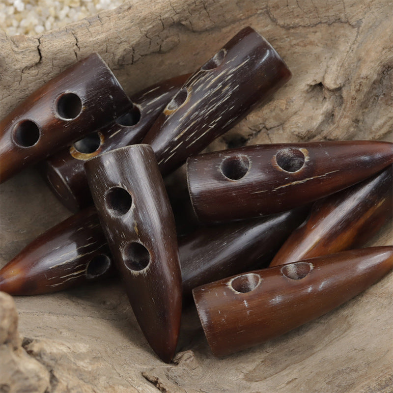 Natural horn toggle buttons, light brown mix of bar and tab shapes with holes
