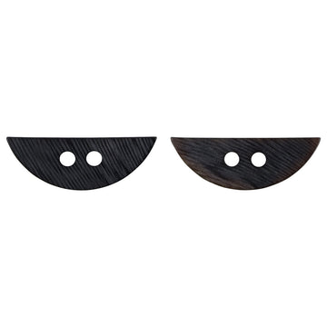 Crescent-shaped black slant-cut horn-look decorative buttons, two with two holes