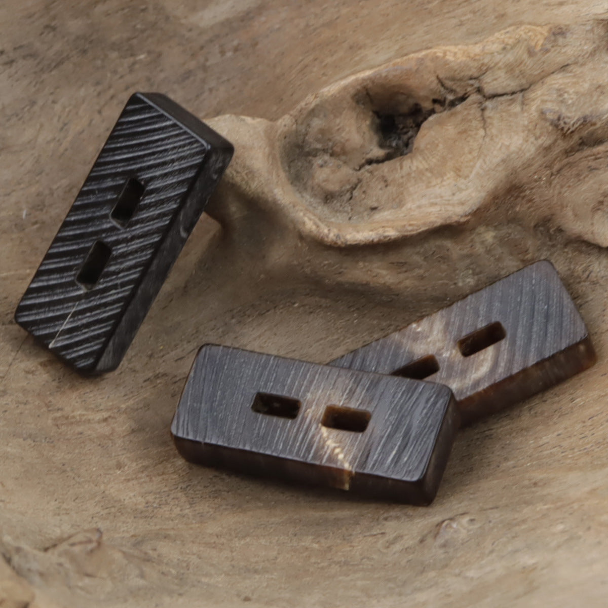 Two-hole rectangular horn toggle buttons, dark gray/black, assorted pieces