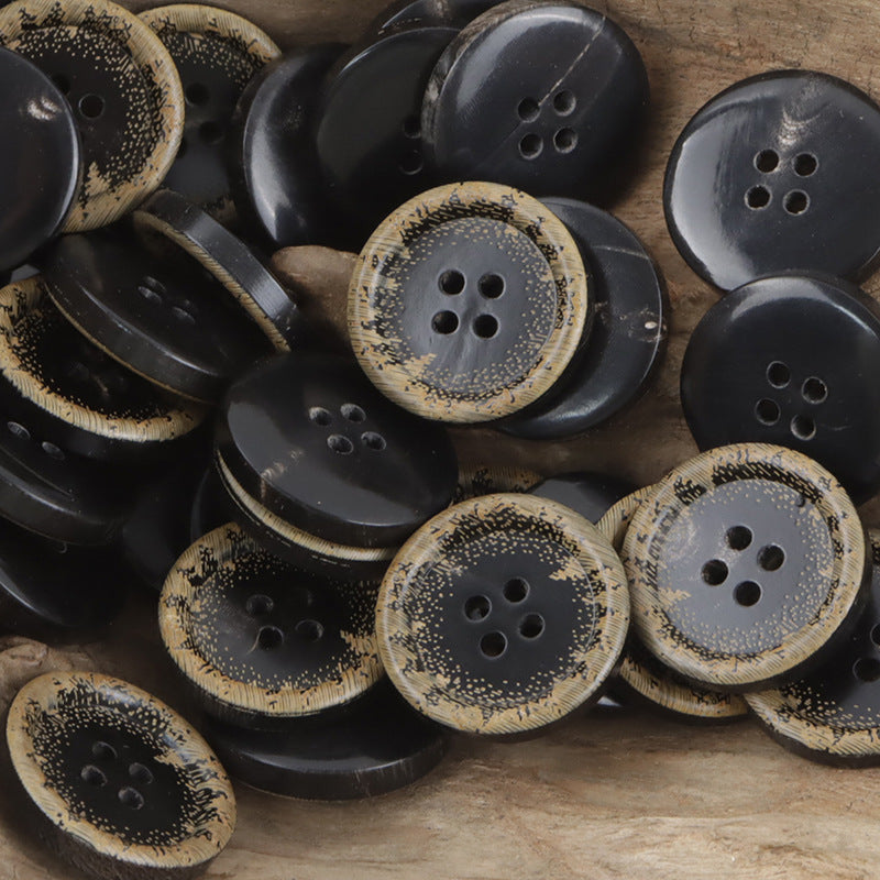 10-pack 4-hole black horn buttons with burnt yellow edge, round