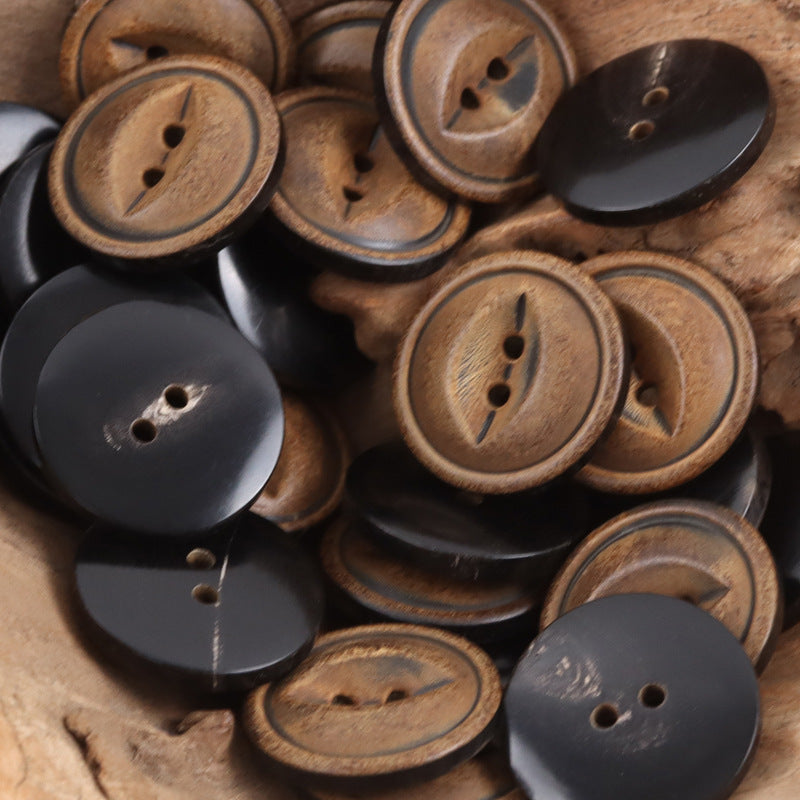 Mixed horn buttons: burnt yellow-brown and dark brown/black rounds with decorative holes