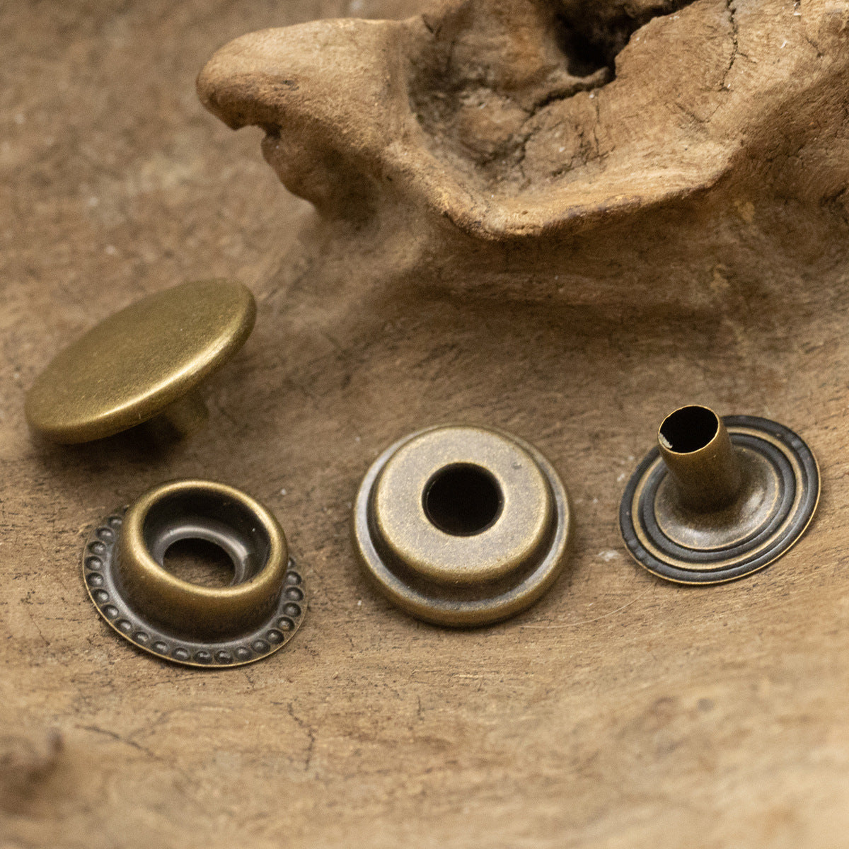 Brass snap stud button bases and caps, textured-ring style, for denim clothing