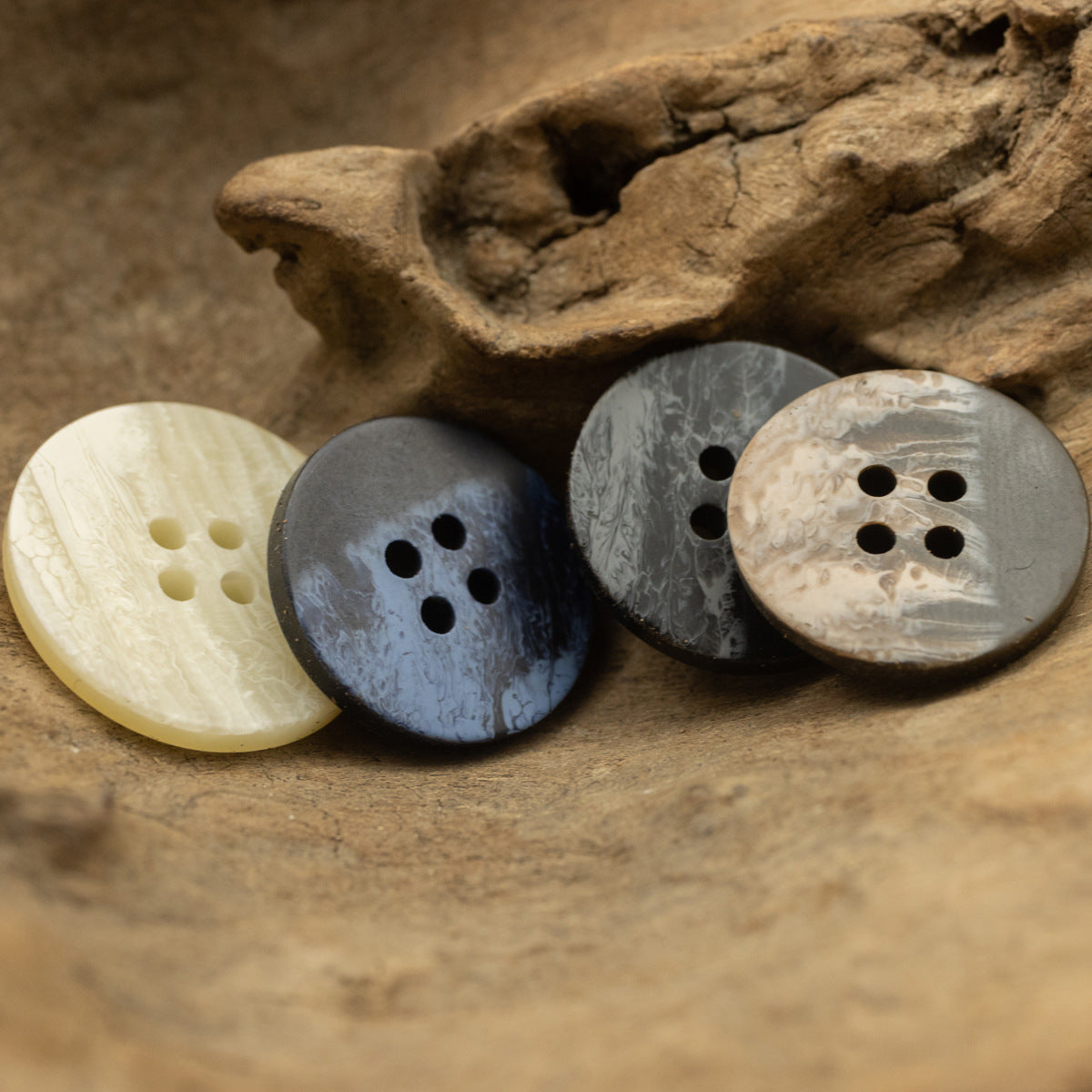 Round flat ripple resin buttons, 4-hole; cream, blue-gray, light beige