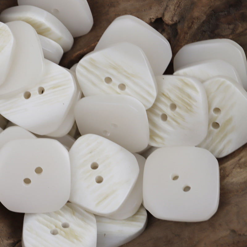 White rounded square resin buttons, 17.5–30mm, ribbed texture, two holes
