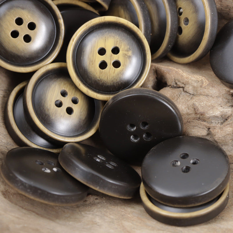 Assorted round resin buttons with 2- and 4-hole designs in dark coffee tones