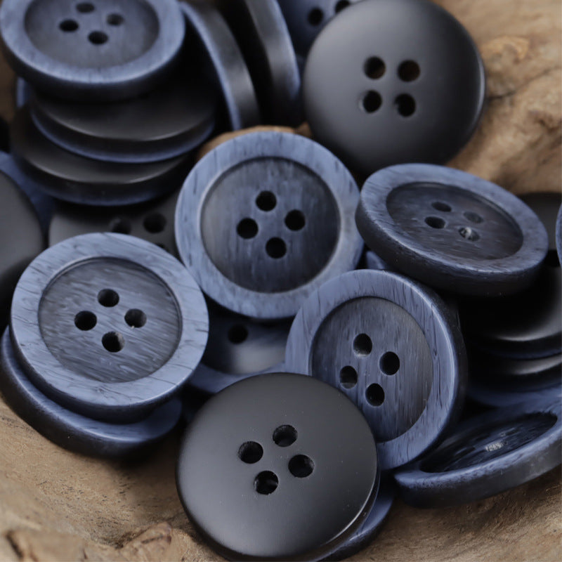 Assorted 4-hole resin buttons in dark and gray-blue tones, imitation wood grain