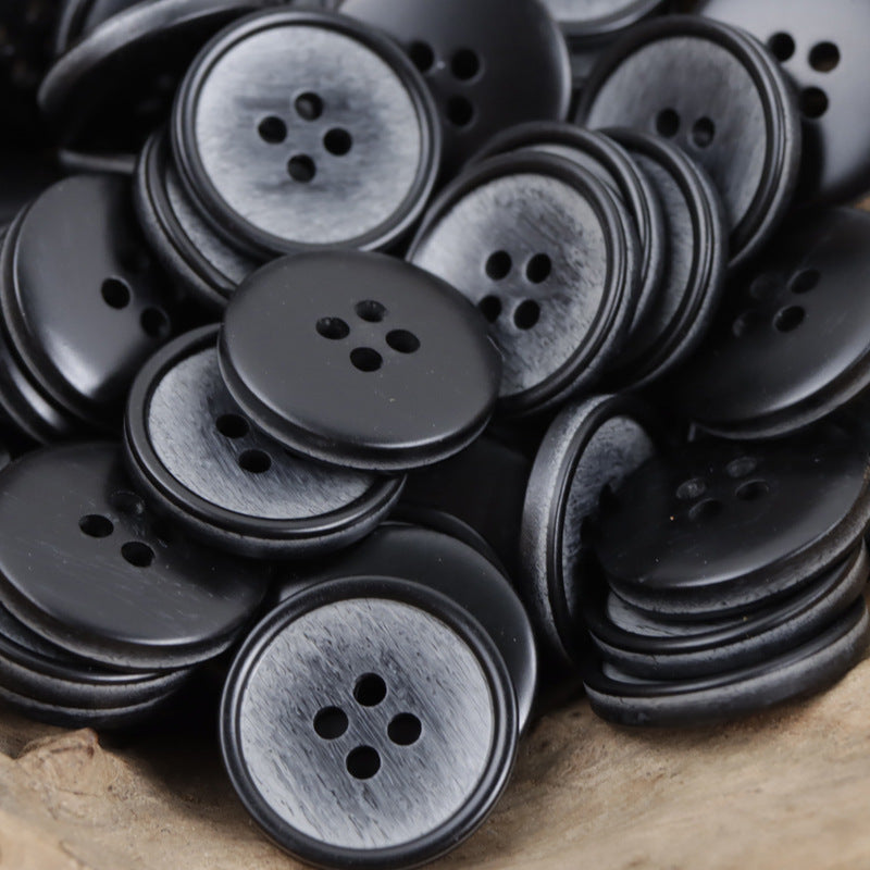 Gray and dark resin buttons pack; round four-hole centers with dark rims