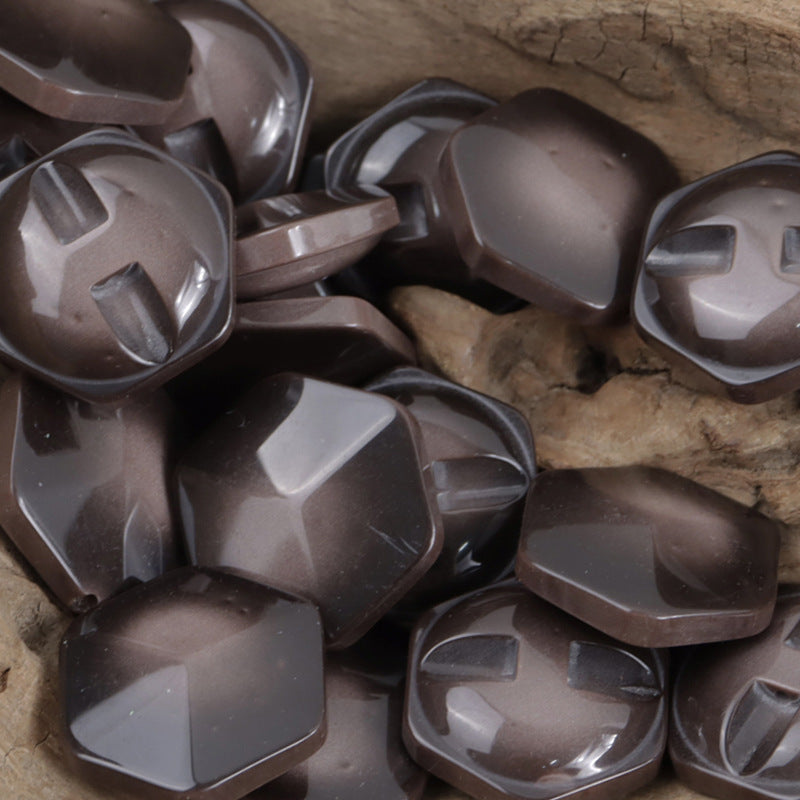 Brown hexagonal resin buttons, close-up front with 2-hole shank