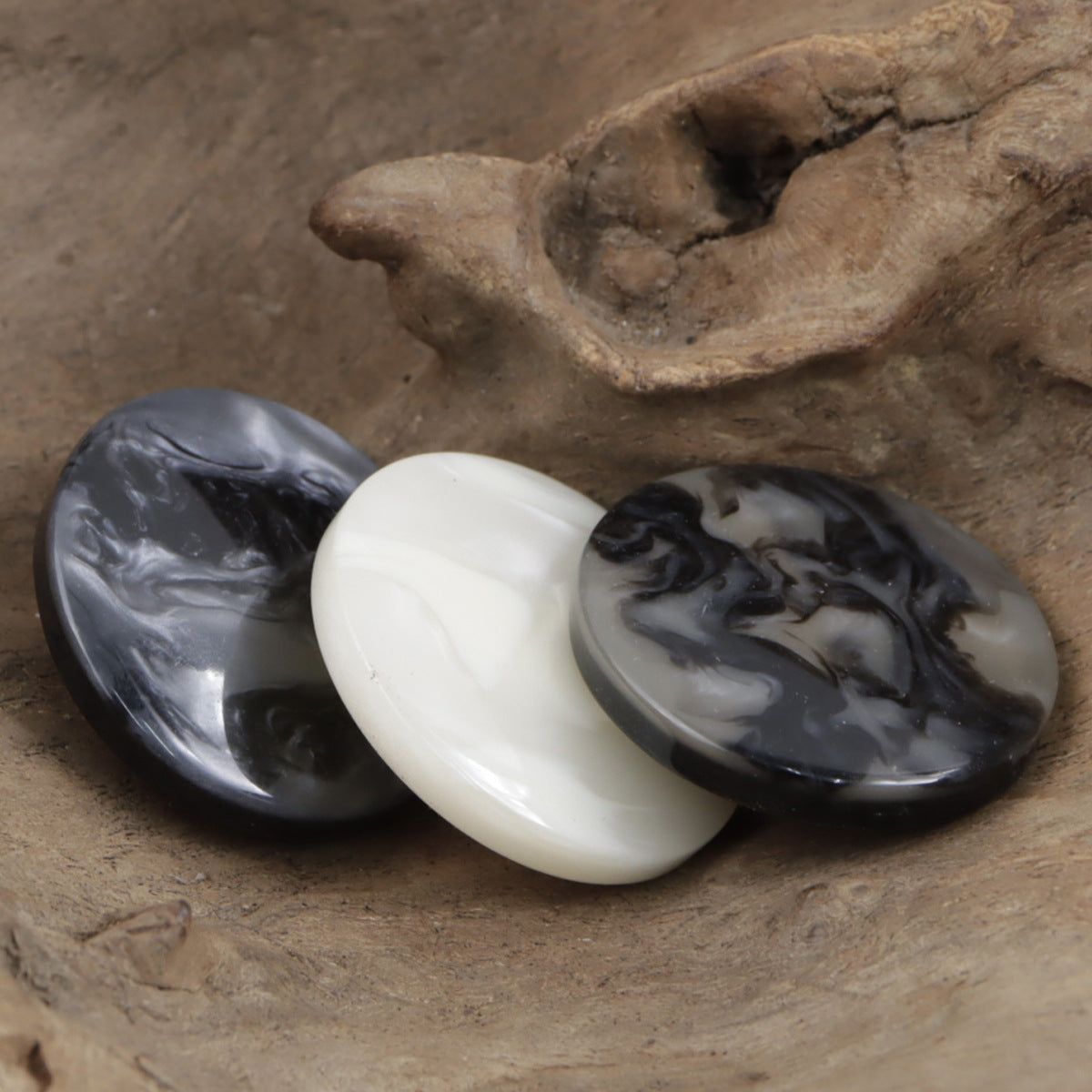 Resin shank buttons with white and dark marble swirl, round coat buttons
